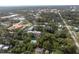 Townhomes nestled in lush greenery, community pool visible at 117 N Garfield Ave # 1, Deland, FL 32724