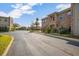 Landscaped area and brick building exterior at 117 N Garfield Ave # 1, Deland, FL 32724