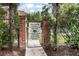 Gated entrance to community pool for residents only at 117 N Garfield Ave # 1, Deland, FL 32724