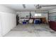 Attached garage with ample storage, workbench, and additional space at 12 Peruvian Ln, Ormond Beach, FL 32174