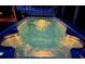 Hot tub at night with illuminated, swirling water at 12 Peruvian Ln, Ormond Beach, FL 32174