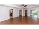 Large main bedroom with hardwood floors and en-suite bathroom at 12 Peruvian Ln, Ormond Beach, FL 32174
