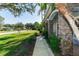 Landscaped walkway leading to the home's entrance at 12 Peruvian Ln, Ormond Beach, FL 32174