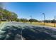 Well-maintained outdoor basketball court with recreational space and park benches at 1278 Chessington Cir, Lake Mary, FL 32746