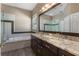 Spa-like bathroom with soaking tub and walk-in shower at 1278 Chessington Cir, Lake Mary, FL 32746