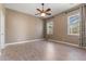 A well-lit bedroom with wood flooring and natural light, offering a serene and comfortable retreat at 1278 Chessington Cir, Lake Mary, FL 32746