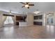 Open-concept living area with hardwood floors, neutral paint, kitchen and dining space at 1278 Chessington Cir, Lake Mary, FL 32746