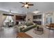 Spacious living room with hardwood floors, dining area, and seamless flow into the kitchen at 1278 Chessington Cir, Lake Mary, FL 32746
