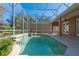 Refreshing screened-in pool in backyard at 1278 Chessington Cir, Lake Mary, FL 32746