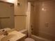 Clean bathroom with a shower/tub combo and vanity at 130 Jasmine Woods Ct # 15C, Deltona, FL 32725