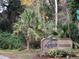 Lakeside Condominiums entrance sign with lush landscaping at 130 Jasmine Woods Ct # 15C, Deltona, FL 32725