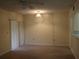 Carpeted dining room with sliding glass doors and ceiling fan at 130 Jasmine Woods Ct # 15C, Deltona, FL 32725