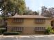 Building exterior with shutters and landscaping at 130 Jasmine Woods Ct # 15C, Deltona, FL 32725
