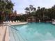 Inviting community pool with surrounding amenities at 130 Jasmine Woods Ct # 15C, Deltona, FL 32725