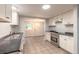 Modern kitchen with stainless steel appliances and white cabinets at 1321 Spring Lake Rd, Fruitland Park, FL 34731