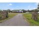 Long driveway leading to a charming farmhouse at 1330 E Taylor Rd, Deland, FL 32724