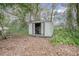 Small metal storage shed in the backyard at 1579 Dunlap Dr, Deltona, FL 32725