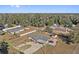 Single story house with carport and large backyard at 1701 N Stone St, Deland, FL 32720