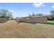 Large backyard with patio furniture and shed at 1701 N Stone St, Deland, FL 32720