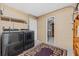 Laundry room features washer, dryer, shelving, and additional storage at 1701 N Stone St, Deland, FL 32720