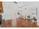 Bright and airy living area with hardwood floors and access to other rooms at 1701 N Stone St, Deland, FL 32720