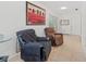 Sunroom with two recliners and access to outdoors at 1701 N Stone St, Deland, FL 32720