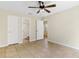 Spacious bedroom with tile floors and ceiling fan at 1768 Santee Ave, Deltona, FL 32738