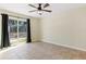 Bright bedroom with tile floors and sliding glass doors at 1768 Santee Ave, Deltona, FL 32738
