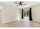 Bedroom with tile floors and access to backyard at 1768 Santee Ave, Deltona, FL 32738