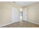 Well-lit bedroom with tile floors and closet at 1768 Santee Ave, Deltona, FL 32738