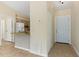 View of entryway with kitchen and exterior door access at 1768 Santee Ave, Deltona, FL 32738