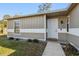 Front door entrance with walkway and landscaping at 1768 Santee Ave, Deltona, FL 32738
