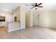 Bright kitchen features white cabinetry, wood countertops, and stainless steel appliances at 1768 Santee Ave, Deltona, FL 32738