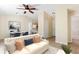 Living and dining area with staged furniture at 1768 Santee Ave, Deltona, FL 32738