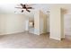 Open living area with kitchen and entryway views at 1768 Santee Ave, Deltona, FL 32738