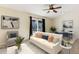 Living room with dining area, featuring staged furniture at 1768 Santee Ave, Deltona, FL 32738