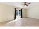 Bright living room with sliding glass door and tile floors at 1768 Santee Ave, Deltona, FL 32738