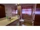 Bathroom with a bathtub, toilet, and vanity at 208 Quaker Ridge Dr, Daytona Beach, FL 32119