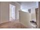 Upper level hallway with access to bedrooms and laundry at 210 Jacobs Landing Ct, Deland, FL 32724