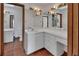 Bright bathroom featuring a large vanity with ample counter space and tiled floors at 2170 Wilmhurst Rd, Deland, FL 32720