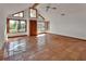 Spacious room with tile floors, lots of light, vaulted ceilings, and triangular windows at 2170 Wilmhurst Rd, Deland, FL 32720