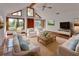 Bright living room with lots of natural light, tile floors, and comfortable seating at 2170 Wilmhurst Rd, Deland, FL 32720