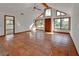 A light, tiled room with triangular windows and an open doorway to another room at 2170 Wilmhurst Rd, Deland, FL 32720