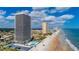 Aerial view of beachfront high-rise building with ocean and city views at 2200 N Atlantic Ave # 1502, Daytona Beach, FL 32118