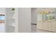 Clean bathroom with updated fixtures and shelving at 2200 N Atlantic Ave # 1502, Daytona Beach, FL 32118