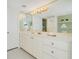 Elegant bathroom with double vanity and ample storage at 2200 N Atlantic Ave # 1502, Daytona Beach, FL 32118