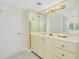 Updated bathroom with a vanity and storage at 2200 N Atlantic Ave # 1502, Daytona Beach, FL 32118