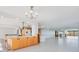 Modern kitchen with large island and stainless steel appliances at 2200 N Atlantic Ave # 1502, Daytona Beach, FL 32118