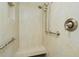 Large walk-in shower with built-in seat and dual shower heads at 2200 N Atlantic Ave # 1502, Daytona Beach, FL 32118