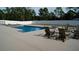 Inviting pool area with lounge chairs and spa at 223 Fort Florida Rd, Debary, FL 32713